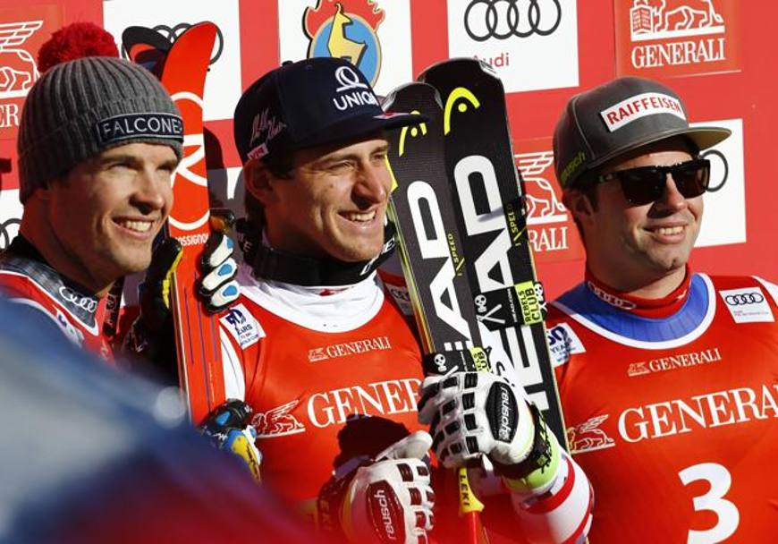 Il podio con il vincitore Matthias Mayer, Christof Innerhofer primo a sinistra e lo svizzero Beat Feuz. Reuters